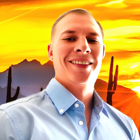 Man smiling in front of desert landscape at sunset. Phoenix, AZ home background with mountains, cacti, and bright sun.